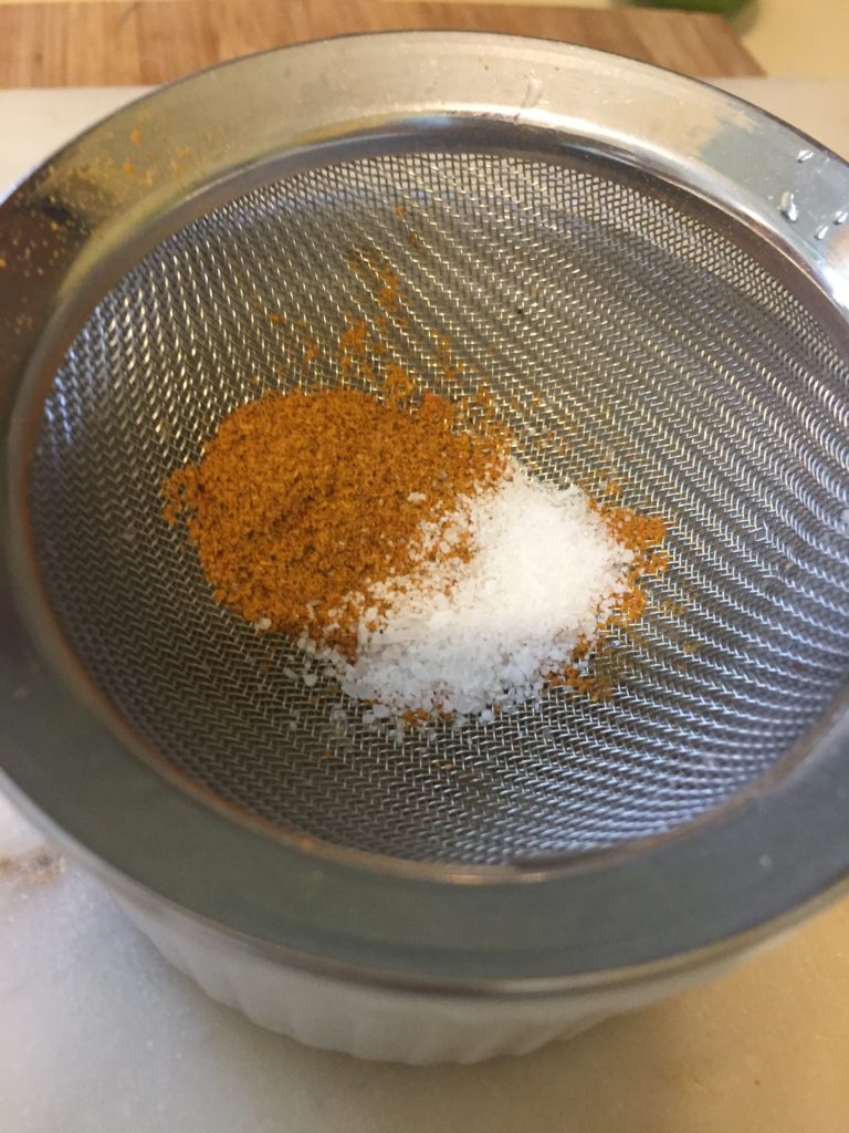 Mix spices to coat tortilla triangles - ibskitchn.com