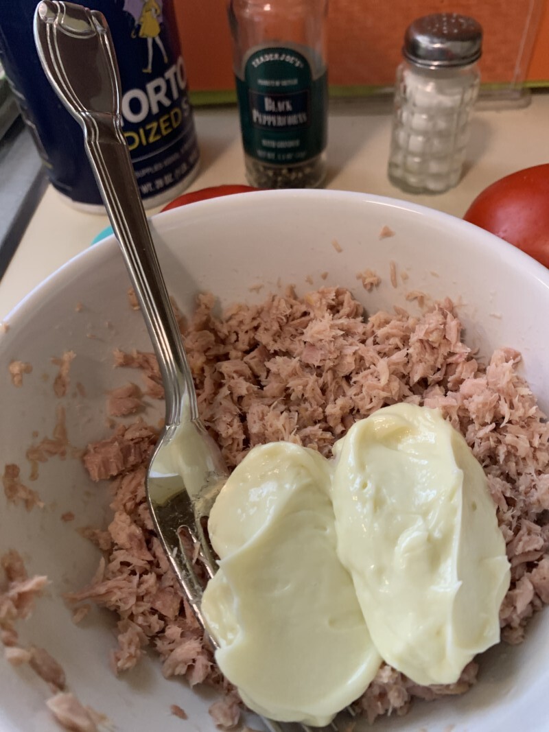Add lite mayo and 2% Greek yogurt to minced tuna